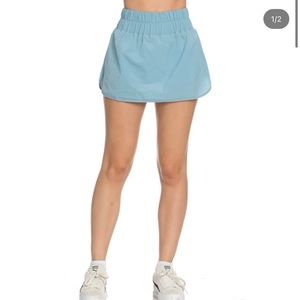 BRAND NEW still in packaging
gold hinge parachute tennis skirt